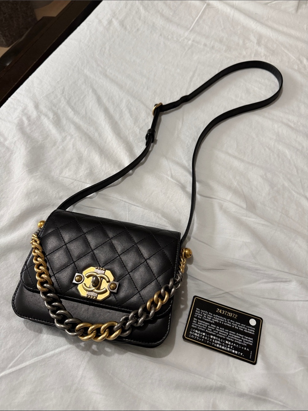 CHANEL Black Quilted Leather Crossbody Bag with Mixed-Metal Chain